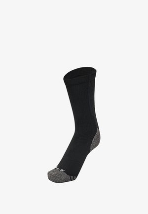 Calzino nero con texture a coste, talloni rinforzati e punta grigia. Presenta una fascia elastica per una vestibilità aderente, adatto per uso casual o all'aperto.