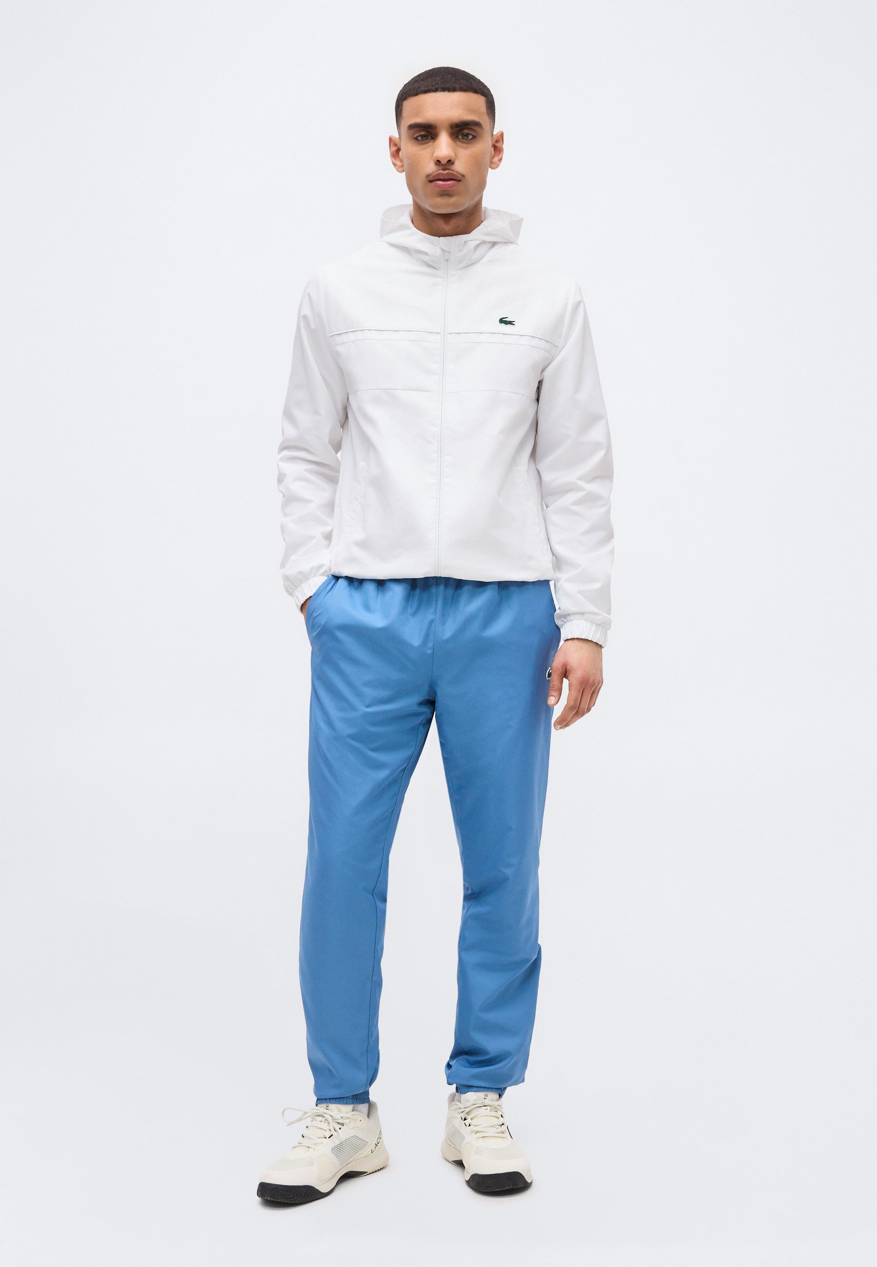 Lacoste Sport TENNIS - Tracksuit bottoms - abyss blue/sencha/blue