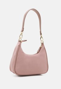 Pink fabric shoulder bag with a smooth texture, featuring a curved shape and gold hardware accents. Zipper closure on top.