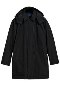 Sort vandtæt parka med hætte, der har en lynlåslomme på brystet og to sidelommer. Fremstillet af glat, let stof.