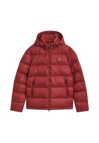 Rote Pufferjacke mit Kapuze, gestaltet mit einem gesteppten Muster, Frontreißverschluss und zwei seitlichen Taschen. Hergestellt aus leichtem Material.