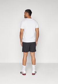 Puma - PERFORMANCE SHORT - Sporta šorti - black Miniatūras attēls 1