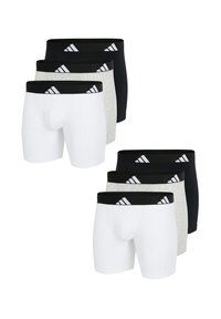 Set med tre par herrboxer i vitt, grått och svart. Tillverkade av mjukt tyg med elastiska midjeband som har en logotyp och randiga detaljer.