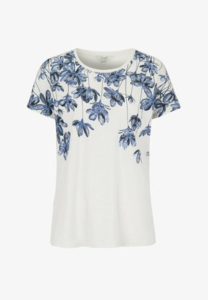 T-shirt blanc à manches courtes avec imprimé floral bleu et noir dégradant depuis l'encolure et les épaules.