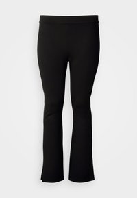 Mustad lõhiku ja laiade sääreosadega püksid, mis on valmistatud venivast kangast, millel on sile tekstuur. Omavad laia vöökohaga ja külgedel lõhikuid äärel.