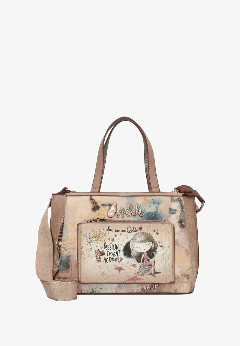 Sac à main synthétique beige avec double poignées, poche avant ornée d'un personnage de dessin animé et motifs abstraits colorés. Bretelle ajustable incluse.
