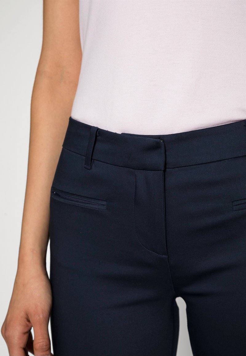 Tommy Hilfiger HERITAGE SLIM FIT PANTS - Trousers - midnight/dark  