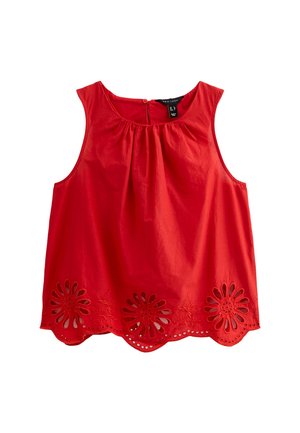 Red sleeveless blouse with gathered neck, floral cutouts at the hem, and a visible label at the back. Made from lightweight fabric.