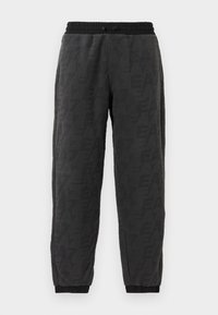 Gray jogger pants with a textured fabric, featuring an all-over logo pattern, elastic waistband, and elastic cuffs at the ankles.