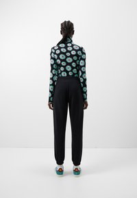 adidas Originals ADICOLOR 70S - Joggebukse - black