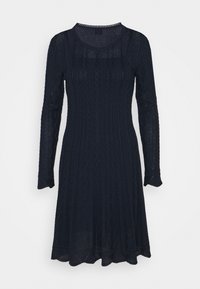 Námorně modré dlouhé šaty s dlouhým rukávem z texturované pleteniny, s kulatým výstřihem a vroubkovaným spodním lemem s geometrickými vzory po celém povrchu.