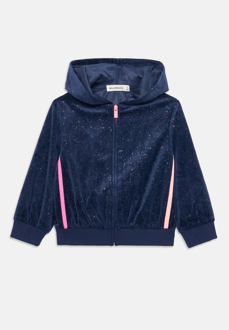 Felpa con zip in velluto blu navy con texture scintillante, strisce laterali rosa e polsini elasticizzati. Include un cappuccio e una chiusura con zip frontale.