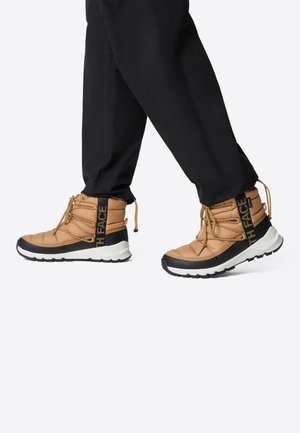 THERMOBALL - Winter boots - almond butter tnf black