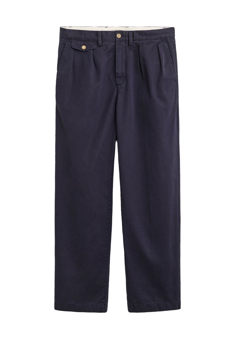 Pantaloni casual blu navy con patta con bottone sulla tasca laterale, pieghe frontali e passanti per cintura.