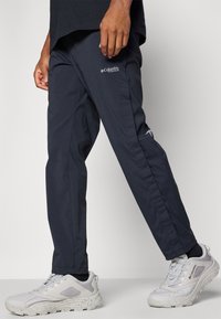 Columbia WANOGA™ PRO VENT PANT - Hlače za otvoreno - black