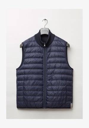 Marineblauer Steppwesten mit einem gesteppten Design, Stehkragen, Frontreißverschluss und seitlichen Taschen. Hergestellt aus leichtem, wasserabweisendem Material.