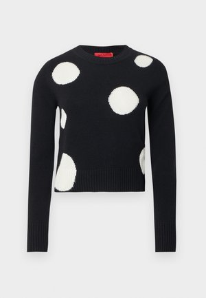 Black sweater with a round neckline and long sleeves, featuring large white polka dots. Ribbed cuffs and hem with a soft knit texture.