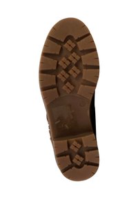 Brun gummisål med tekstureret slidbane, der har diamantskabeloner for bedre greb. Robust design egnet til udendørs brug.