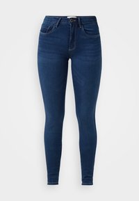 Jeans ajustados de denim azul oscuro, con una cintura de altura media, costuras en contraste, bolsillos delanteros y un diseño clásico de cinco bolsillos.