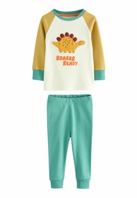 Baumwoll-Pyjama-Set mit einem cremefarbenen Langarmoberteil, das ein Dinosaurier-Motiv und orangefarbigen Text zeigt. Begleitet von türkisfarbenen Leggings mit schmalen Bündchen.