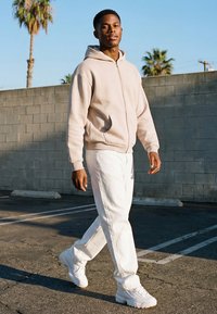 Karl Kani SMALL SIGNATURE TEDDY TROYER UNISEX  - Fleece jumper - light sand