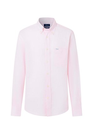 Jasnoróżowa koszula na długi rękaw z guzikami, kołnierzykiem na guziki oraz kieszonką na piersi z małą naszywką z logo.
