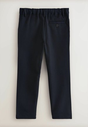Donkerblauwe broek van een gladde stof, met een elastische tailleband, rechte pijpen en een achterzak met knoopsluiting.