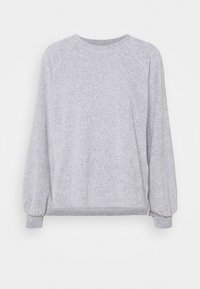 Sudadera gris hecha de un material suave con un ajuste holgado, mangas raglán y puños elásticos. Diseño minimalista sin patrones.