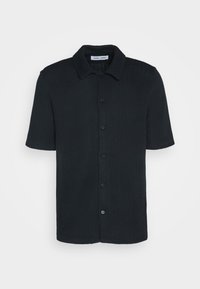 Kurzärmeliges Hemd in Schwarz mit strukturiertem Rippenstrick-Design, Knopfleiste vorne und klassischem Kragen für eine entspannte Passform.