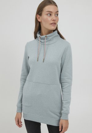 Light gray hoodie with a high neckline, adjustable drawstrings, and front pocket. Soft fabric with ribbed cuffs and hem.