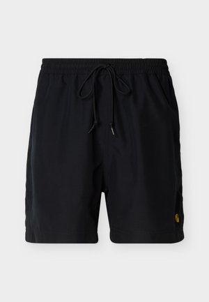 Pantaloncini a vita elastica neri con coulisse, tasche laterali e un piccolo logo giallo Carhartt sulla gamba sinistra.