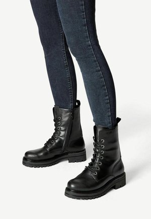 Bottines à lacets - black
