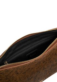 Brown animal print clutch with black interior, gold zipper detailing, and smooth leather trim. Features a zippered pocket inside.