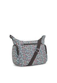 Patterned shoulder bag with a turquoise base, red and black abstract prints, brown adjustable strap, and multiple zippered pockets.