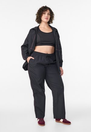 HOHER TAILLE - Pantalones deportivos - black