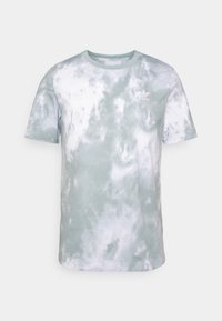 Light green tie-dye cotton t-shirt with a crew neck and short sleeves; features a small white logo on the chest.