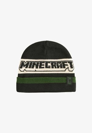 Fekete kötött sapka fehér "Minecraft" logóval és zöld csíkkal. Oldalán egy kis zöld blokk figura címke található.