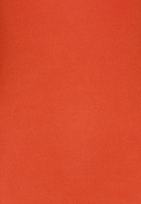 Tissu orange vif texturé avec un motif en maille fine et de légères variations de teinte à travers la surface.