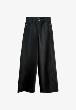 Schwarze weit geschnittene Jeans aus Denim, mit hohem Bund, Fronttaschen und kontrastierenden Seitennähten. Sauberes, minimalistisches Design.