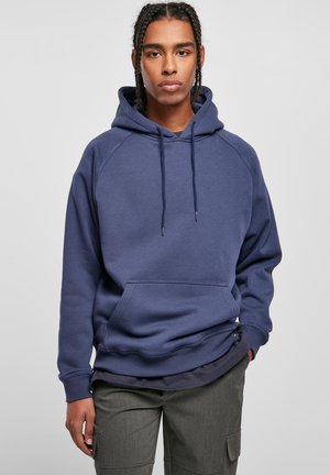 Navy blue hoodie made of soft material, featuring a front kangaroo pocket, adjustable drawstrings, and ribbed cuffs. Casual fit design.