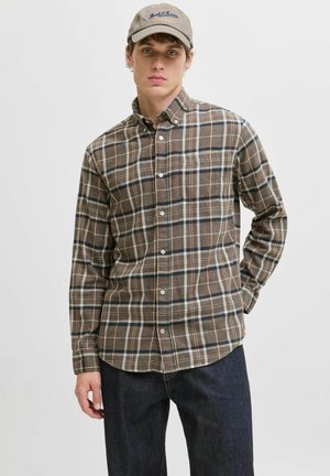 Brown plaid button-up shirt with white and navy accents, featuring a collar and long sleeves, made of a textured fabric.