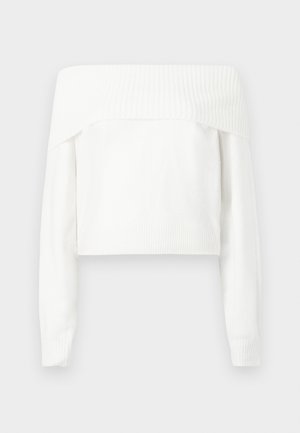 Balti, bepečių, minkštos mezgimo medžiagos, su ilgomis rankovėmis ir raukšlėmis aplink kaklą bei rankogalius.