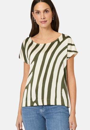 Short-sleeve top with a rounded neckline, features a green and cream zebra stripe pattern, made from smooth fabric.