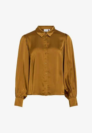 Satynowa bluzka w musztardowym kolorze z długimi rękawami, zapinana na guziki z przodu, klasycznym kołnierzem oraz dopasowanymi mankietami z plisowanym detalem na rękawach.