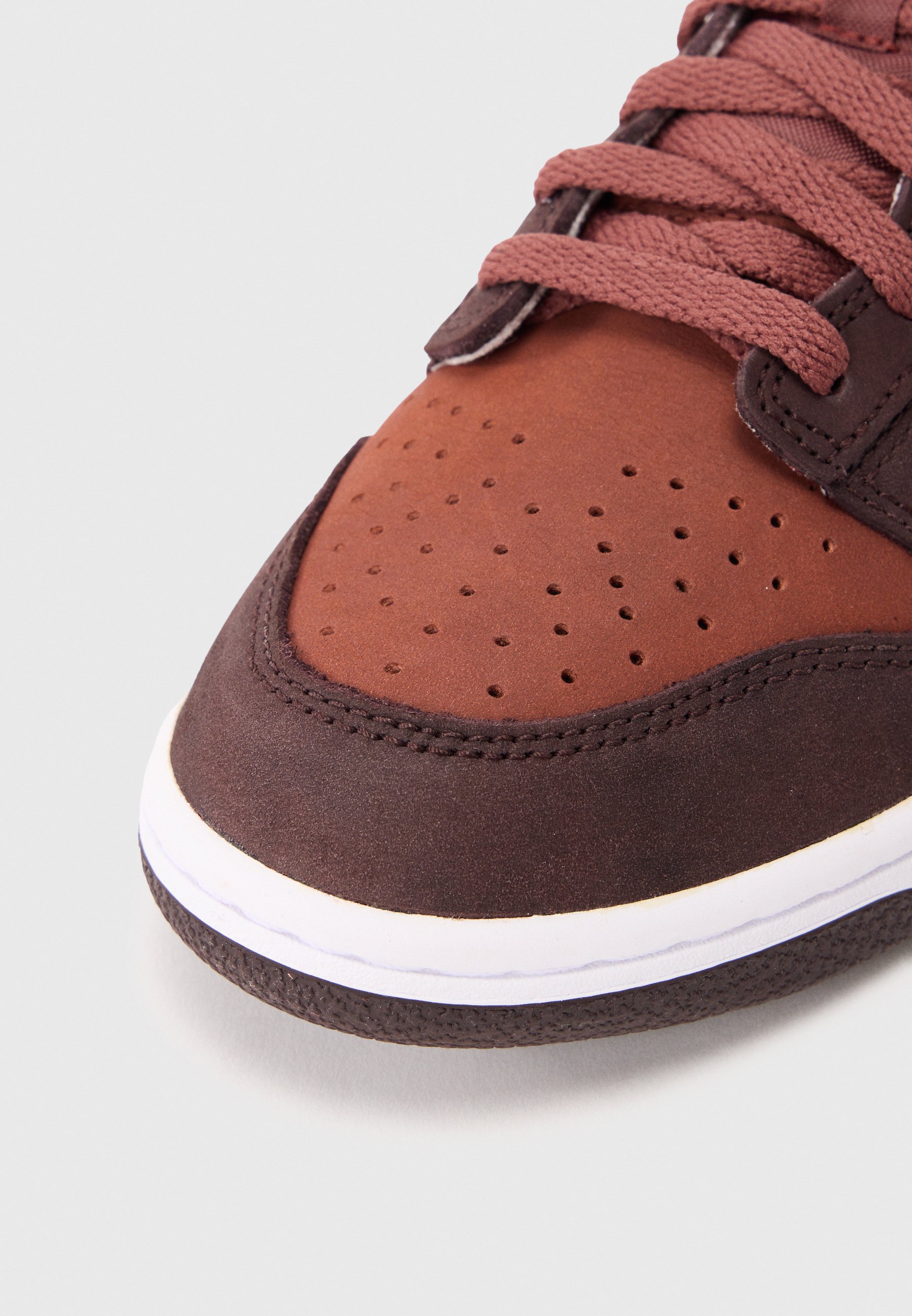 brown and red nike dunks