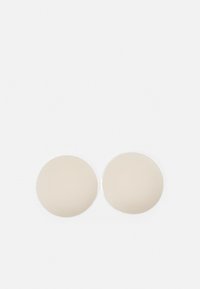 Beige round compact with a metallic silver hinge. Features a smooth, matte texture on surfaces. Foldable design for portability.