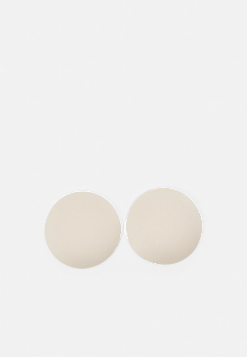 Beige round compact with a metallic silver hinge. Features a smooth, matte texture on surfaces. Foldable design for portability.