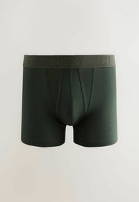 Donkergroene herenboxershorts met een zachte tailleband gemarkeerd met 'NEXT.' Glad materiaal met een aansluitend ontwerp en zonder zichtbare patronen of accenten.