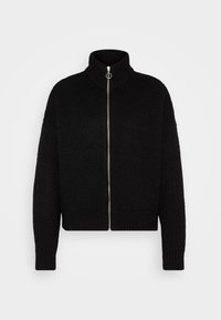 Suéter negro de punto con cuello alto, mangas largas y cremallera frontal. Presenta una tela texturizada y un diseño corto.