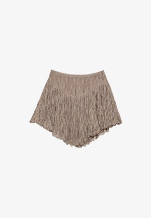 Franskjol i mjuk beige tyg, med en texturerad design med vågiga linjer och en utsvängd form, utformad för en avslappnad passform.